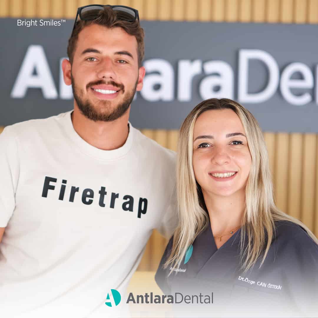 dentist and patiens smile at camera in dental clinic Turkey