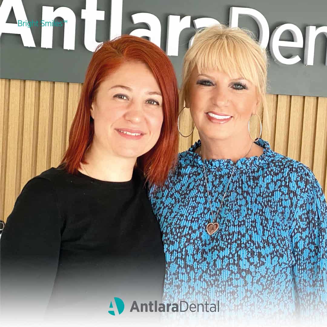 Patient After Zirconia Crown Dt. Dilek and patient gives pose for camera following zirconia crown in Antalya